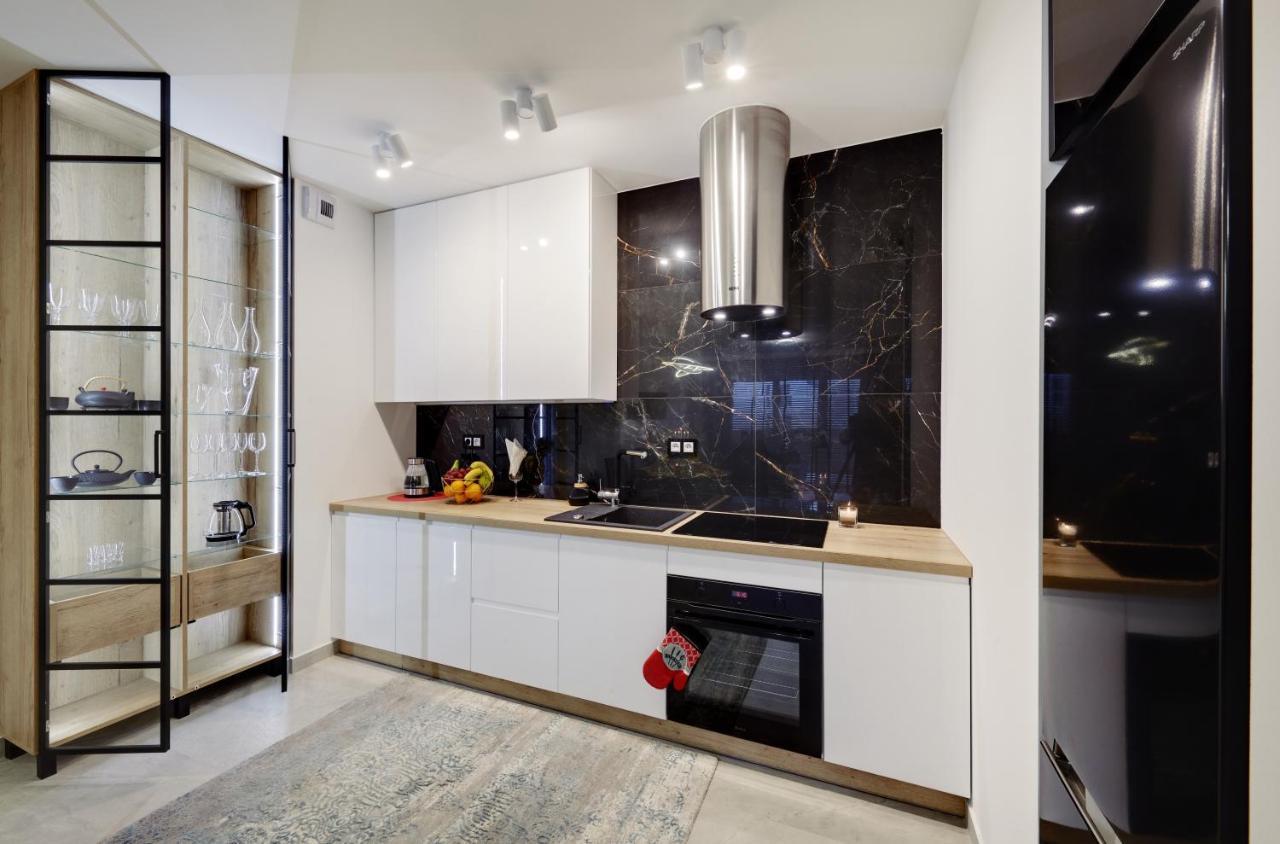 Seven Heaven Apartment คาโตวีตเซ ภายนอก รูปภาพ